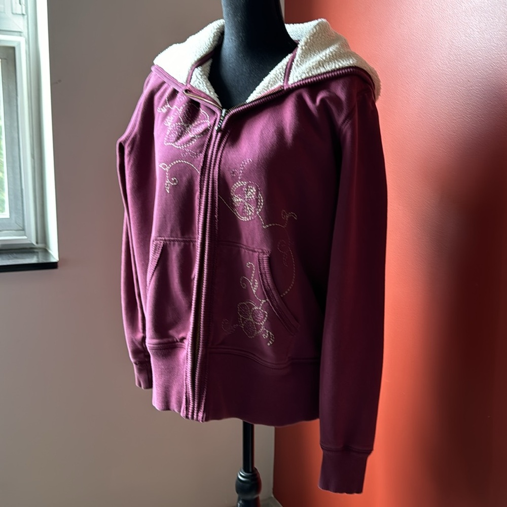 Heavily fleece  lined hooded zip up sweatshirt with two front pockets